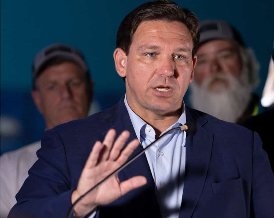 Picture of DeSantis stating, 'No One Should Have to Choose Between a Jab and a Job'