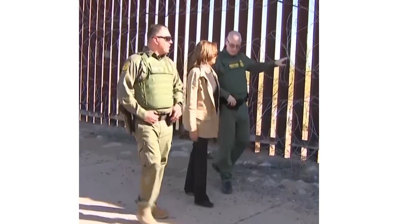 Picture of Vice President Kamala The Kackler Harris at the Border with Border Patrol Brass